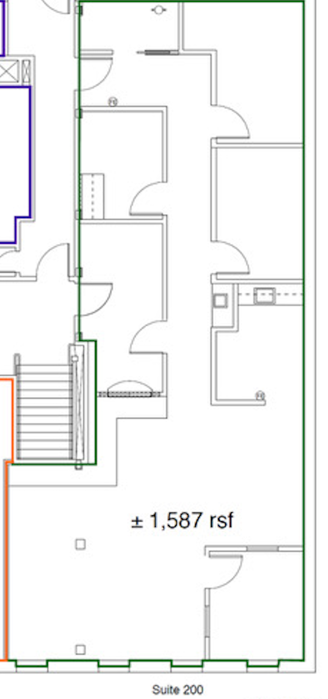 A floor plan of a building with a staircase