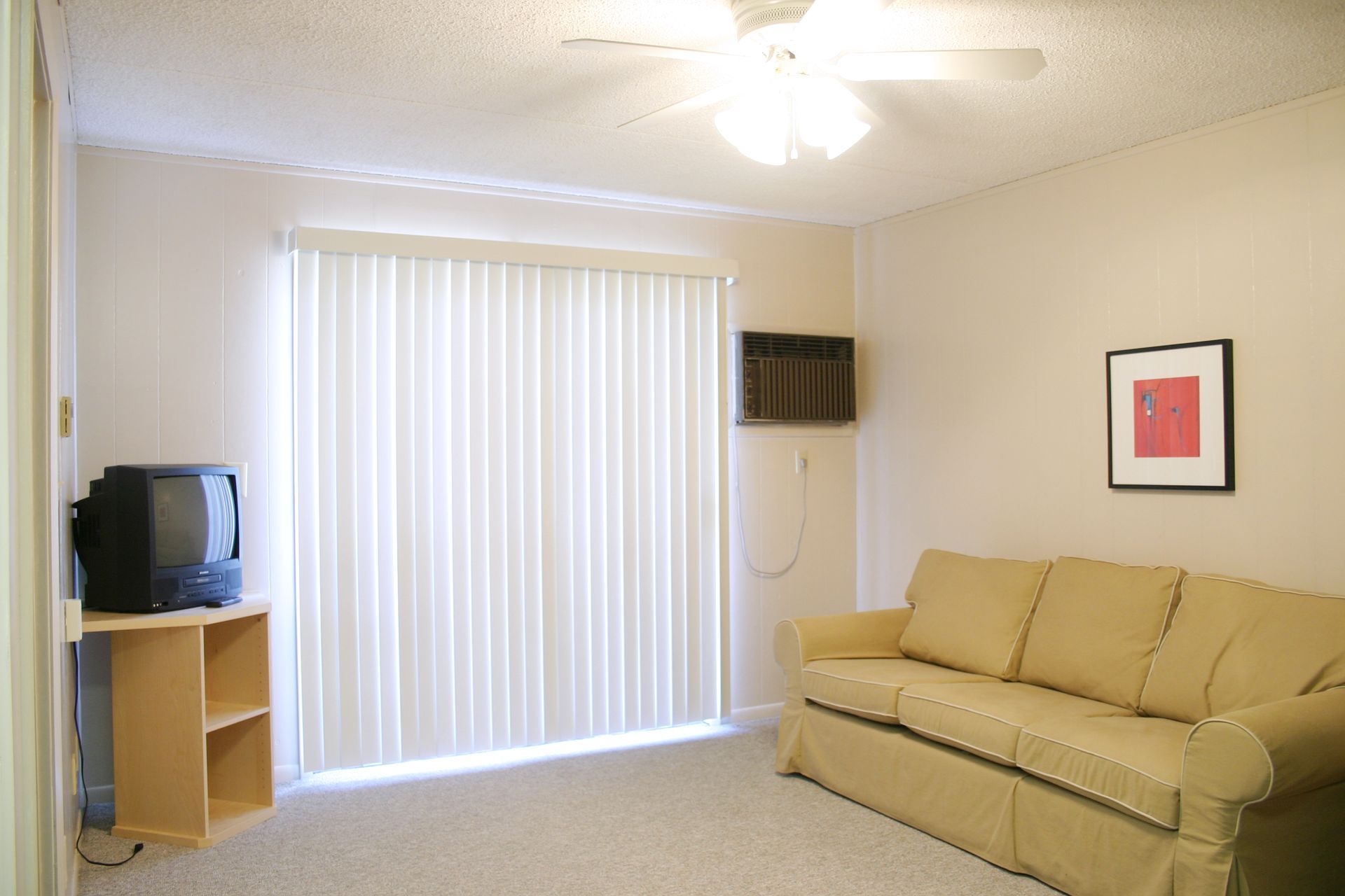 Photo showing a living room with plenty of natural lighting