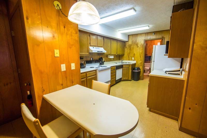 Photo showing a small dining area next to the kitchen