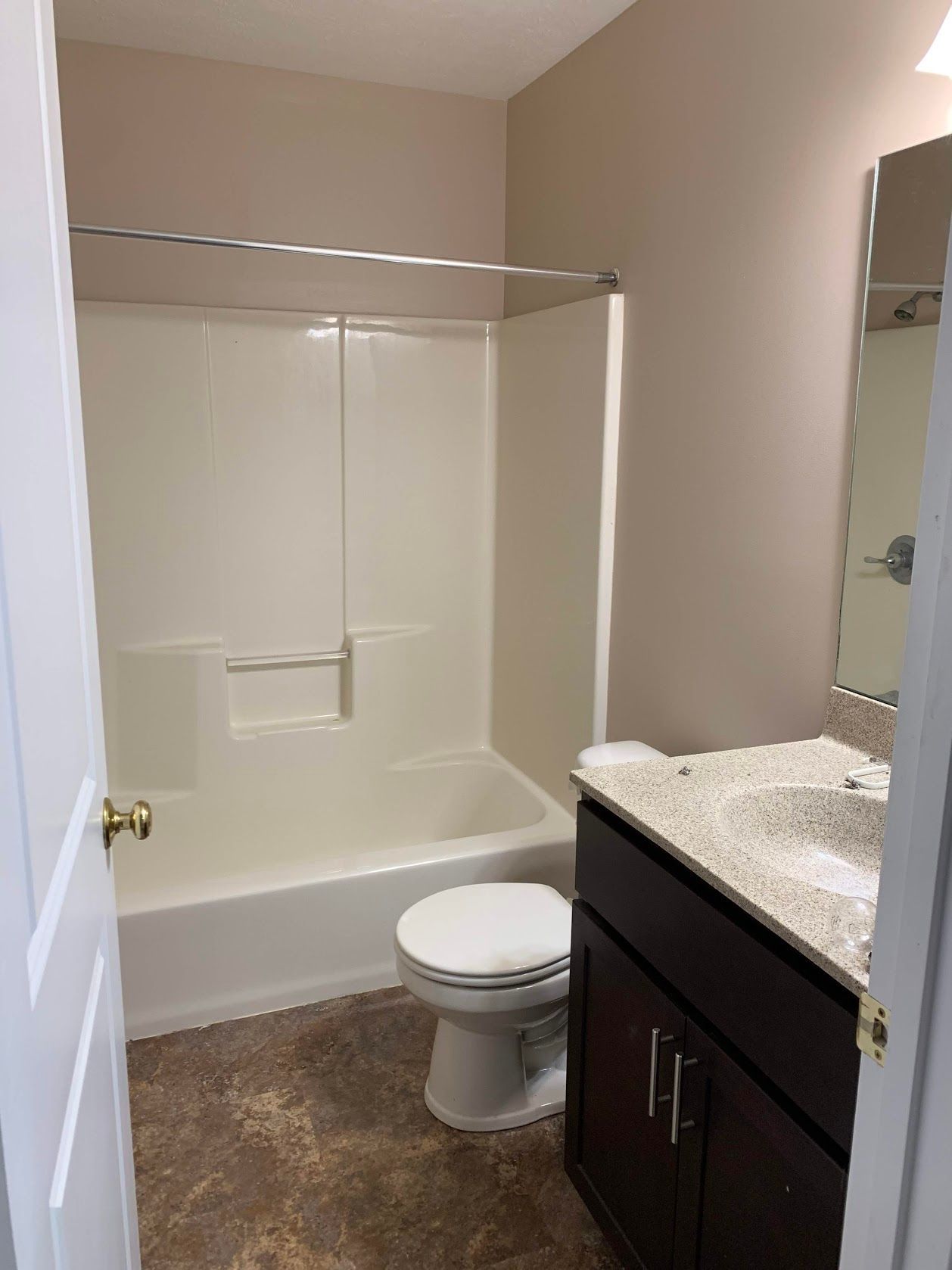 Photo showing a bathroom with a shower/tub combo