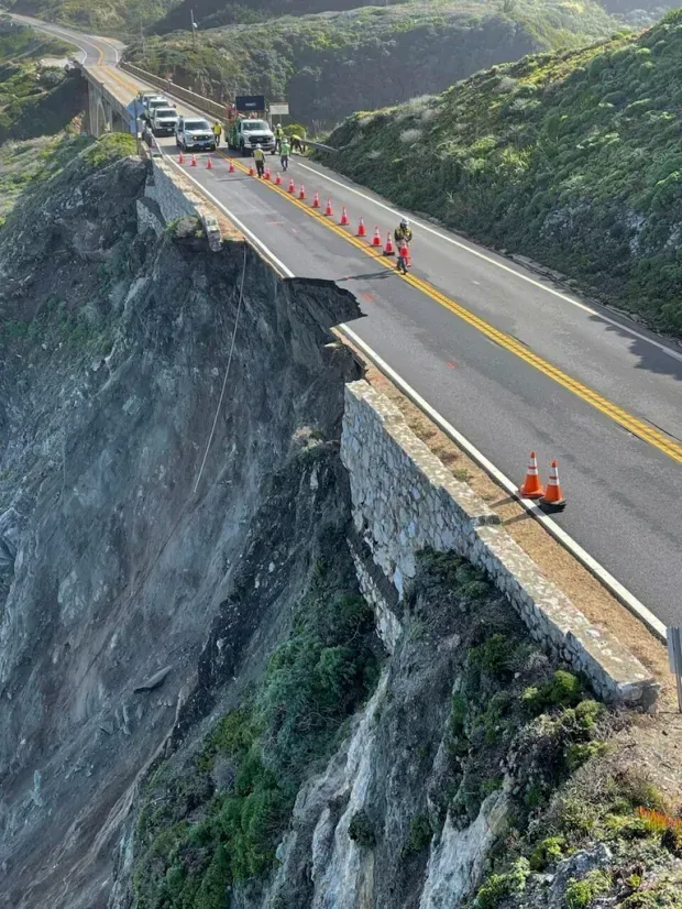 A road with a cliff on the side of it