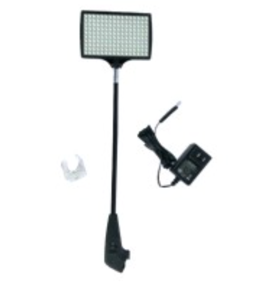 Black metal detector with rectangular search coil, control box, and small white accessory on white background