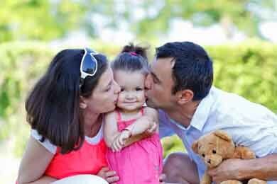 Happy Couple Adopted a Cute Child — Child Support in Bakersfield, CA