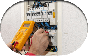 electrician using multimeter