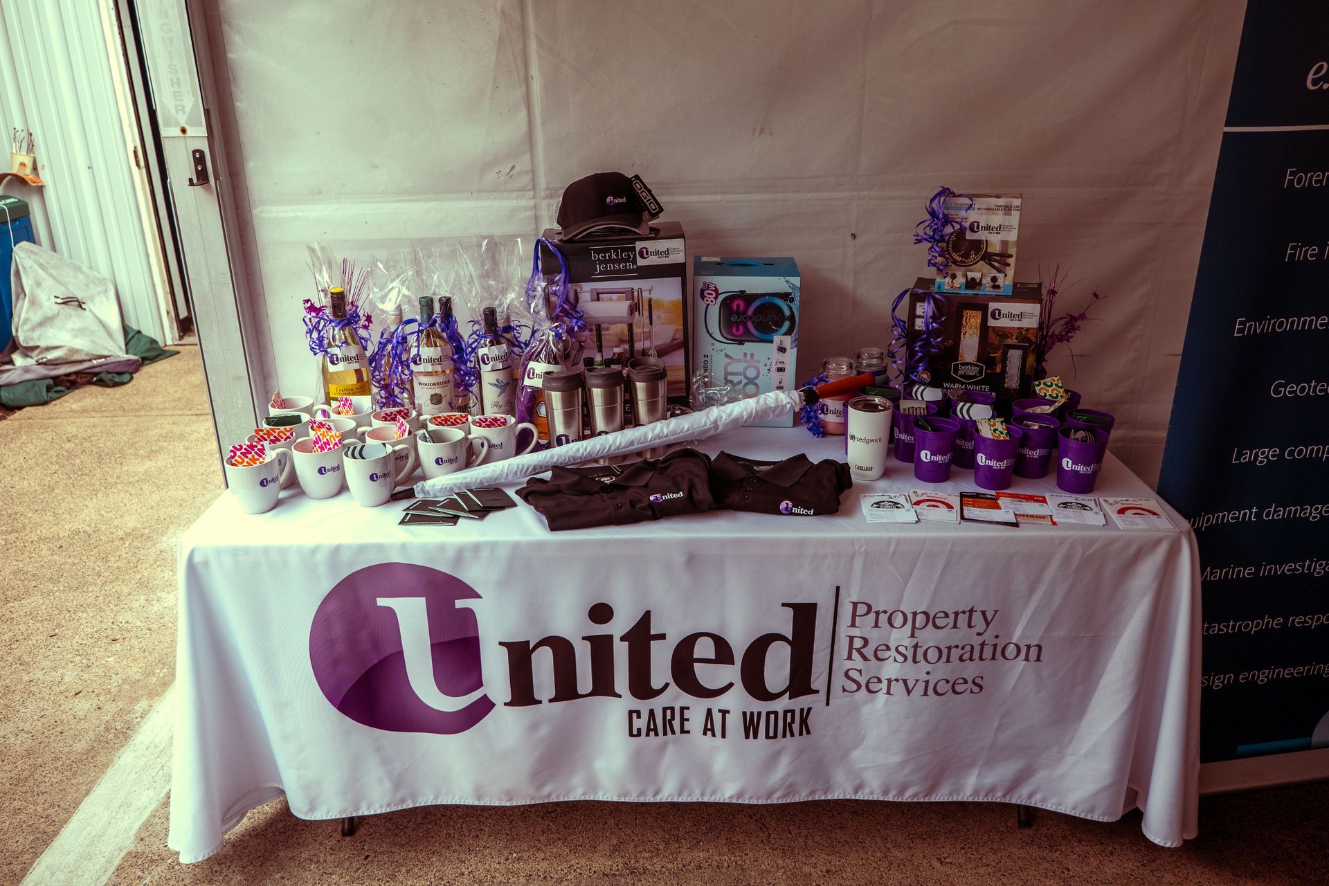 A table with a united property restoration services sign on it