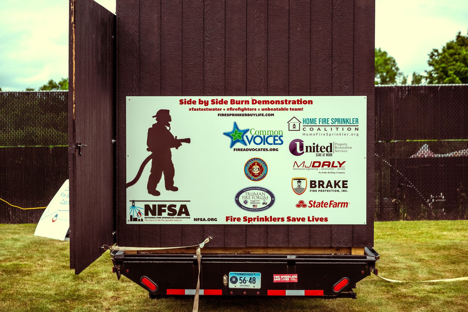 A sign on the back of a trailer says nfsa