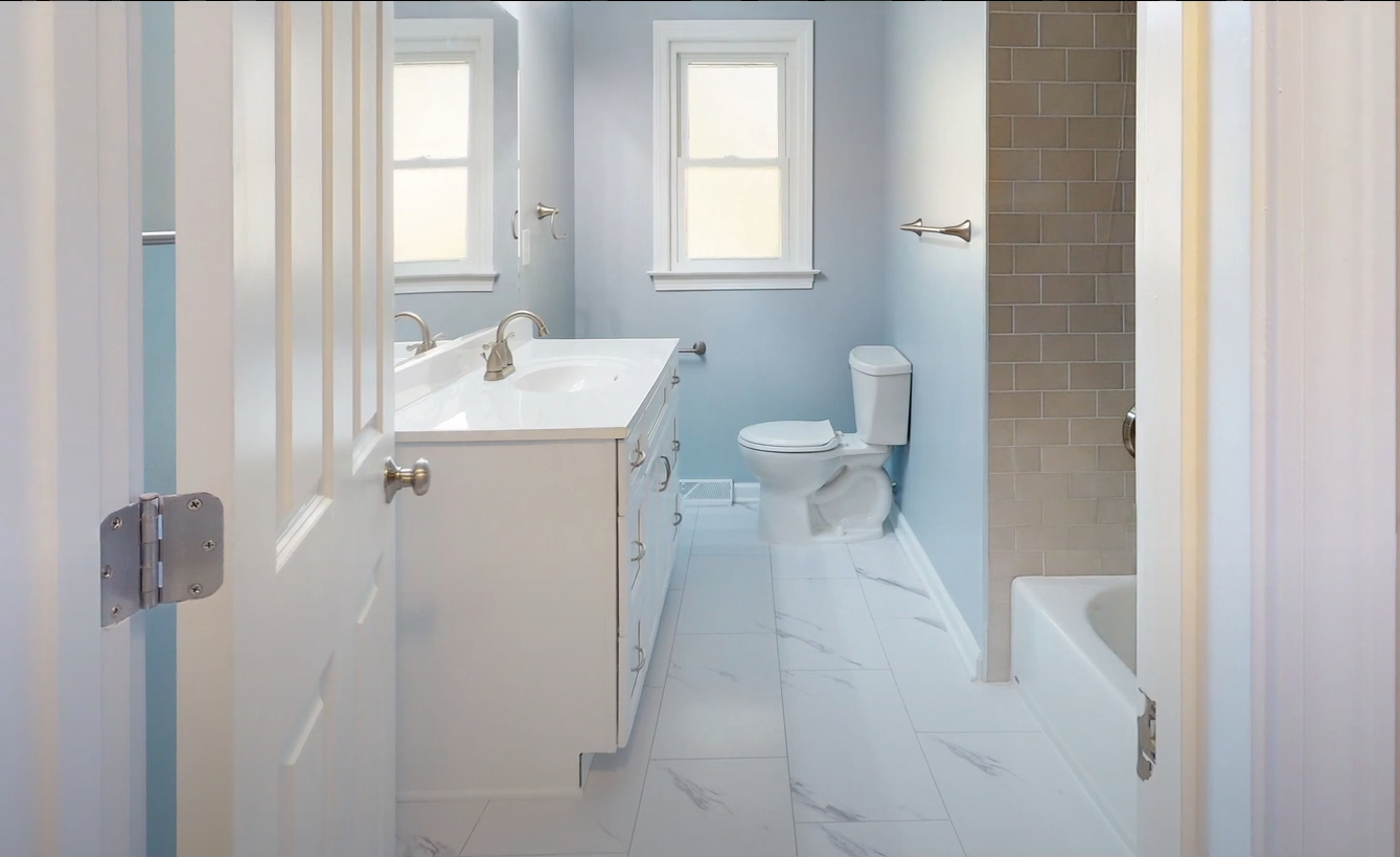 A woman wearing glasses and hoop earrings is smiling in front of a purple background that says uprs case studies episode 4