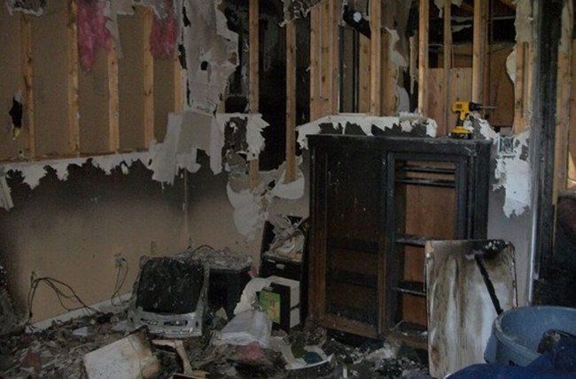 A room in a house that has been damaged by a fire.