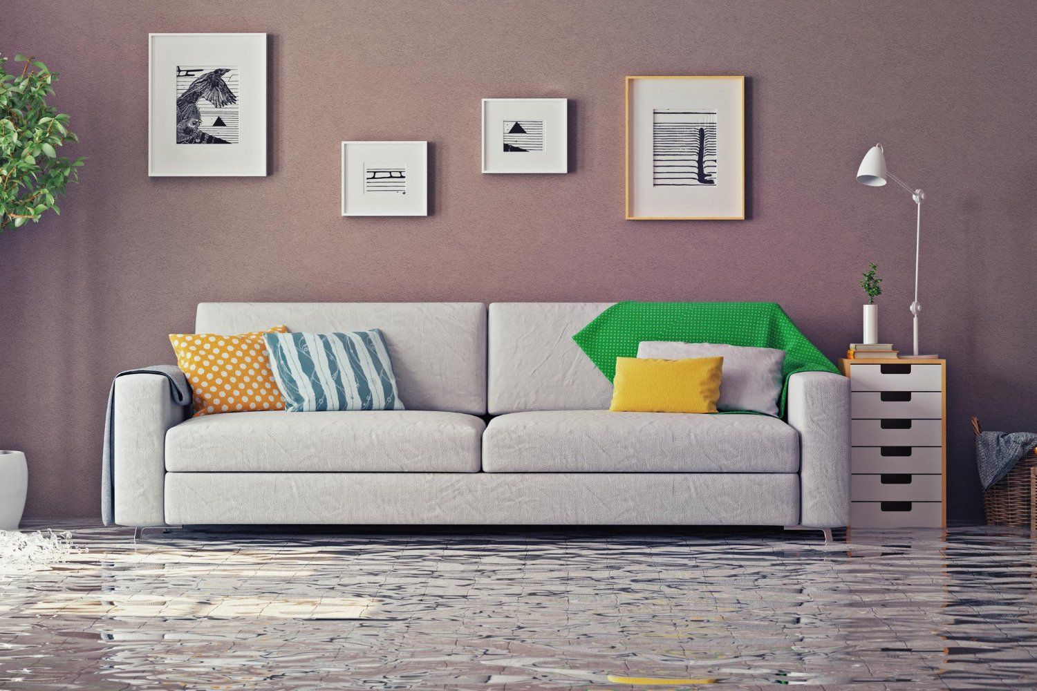 A living room with a white couch and a flooded floor.