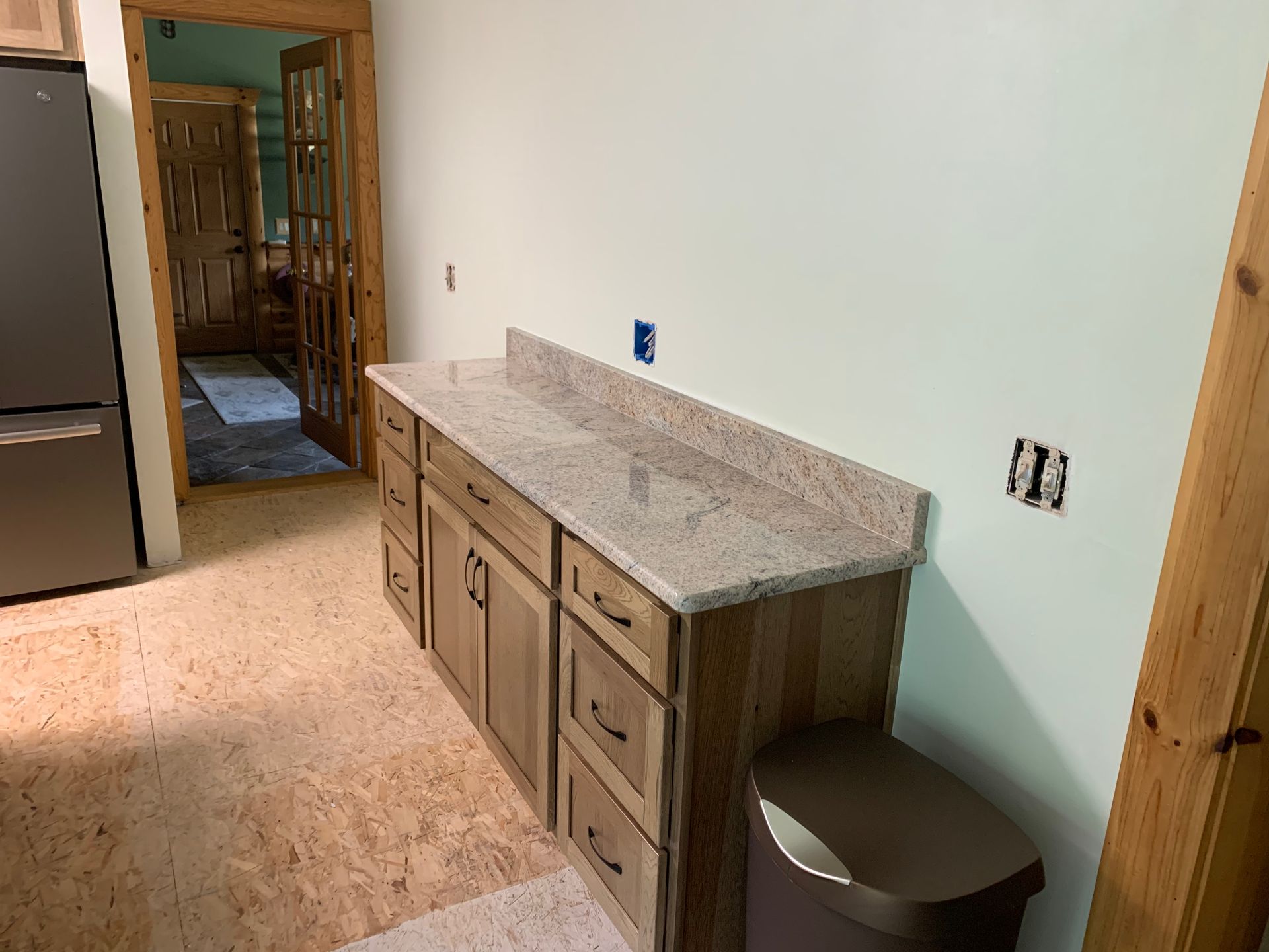 Cabinets And Trash Can - Clarkston, Michigan - Hidden Lake Cabinet & Trim LLC