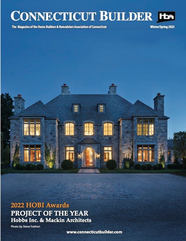 Cover of Connecticut Builder magazine: Stone mansion lit at dusk; Hobbs Inc. & Mackin Architects, Project of the Year.
