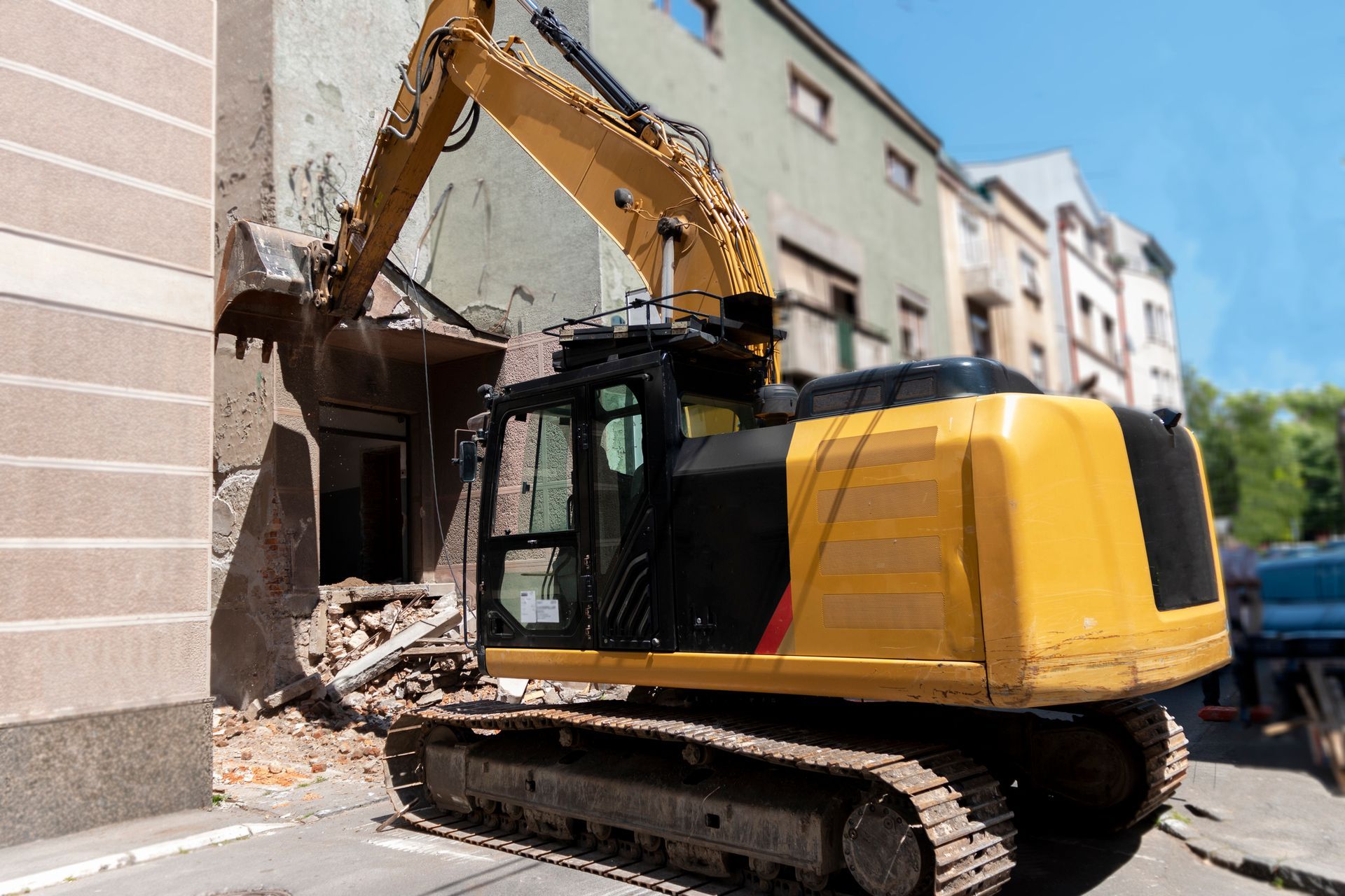 Excavator breaking house – West Mifflin, PA - CTS Construction-Excavation, Inc.
