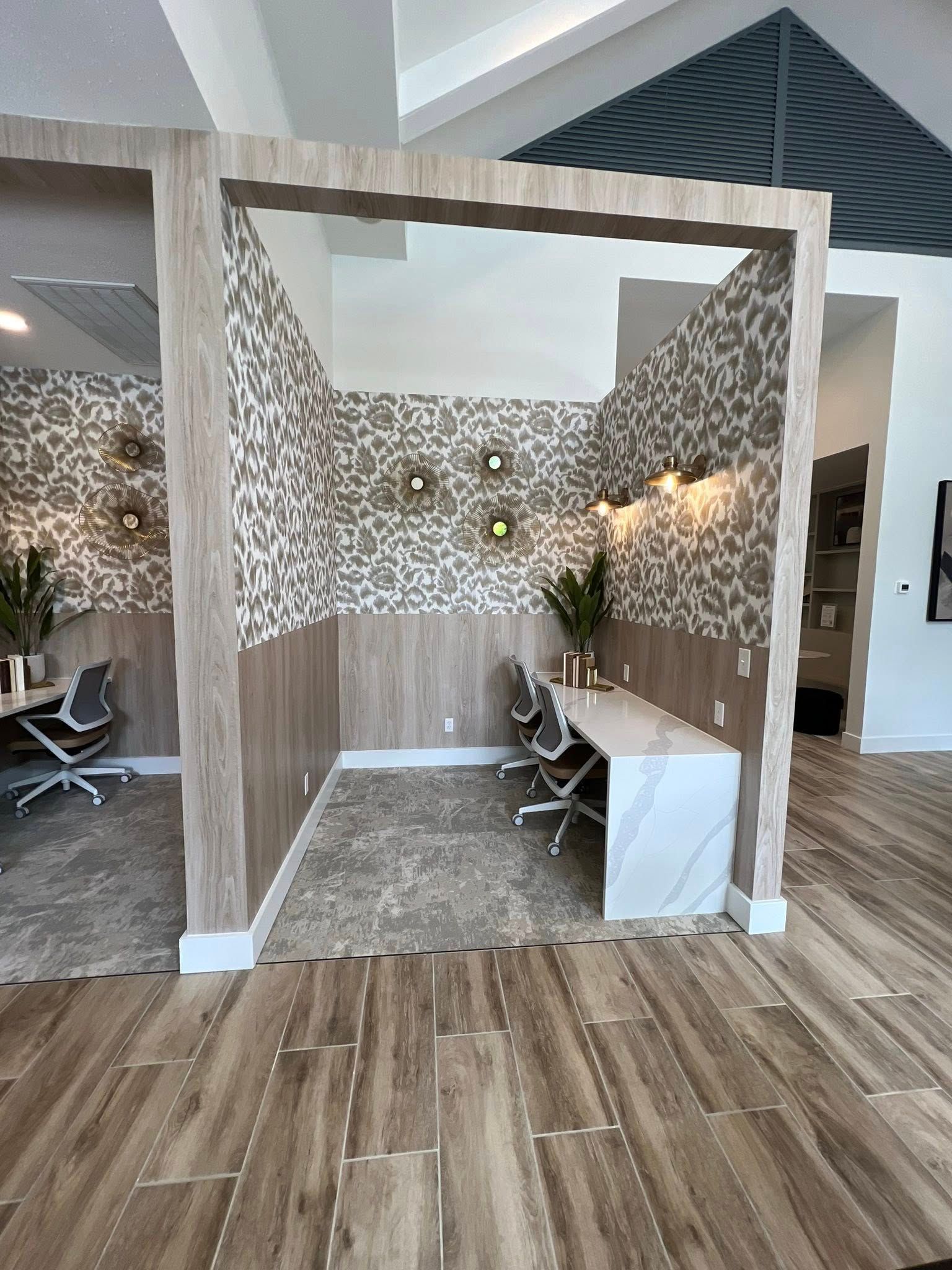 Modern co-working space with two individual work cubicles.