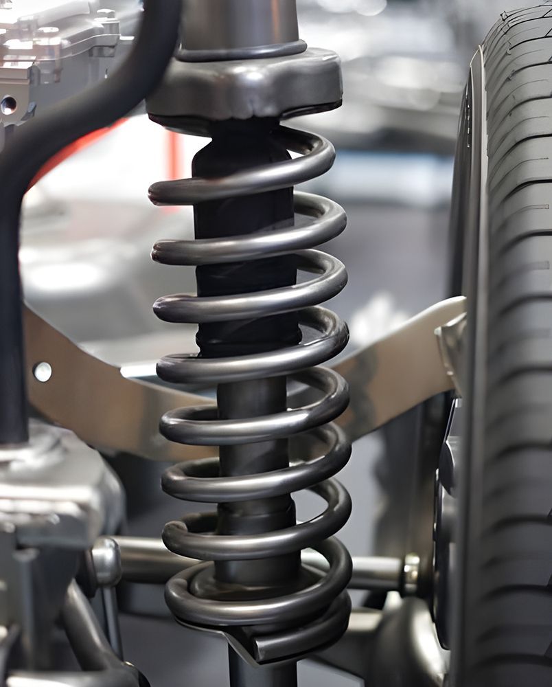 A Close Up of a Car Shock Absorber — Transtate Trailers & 4wd In Belconnen, ACT