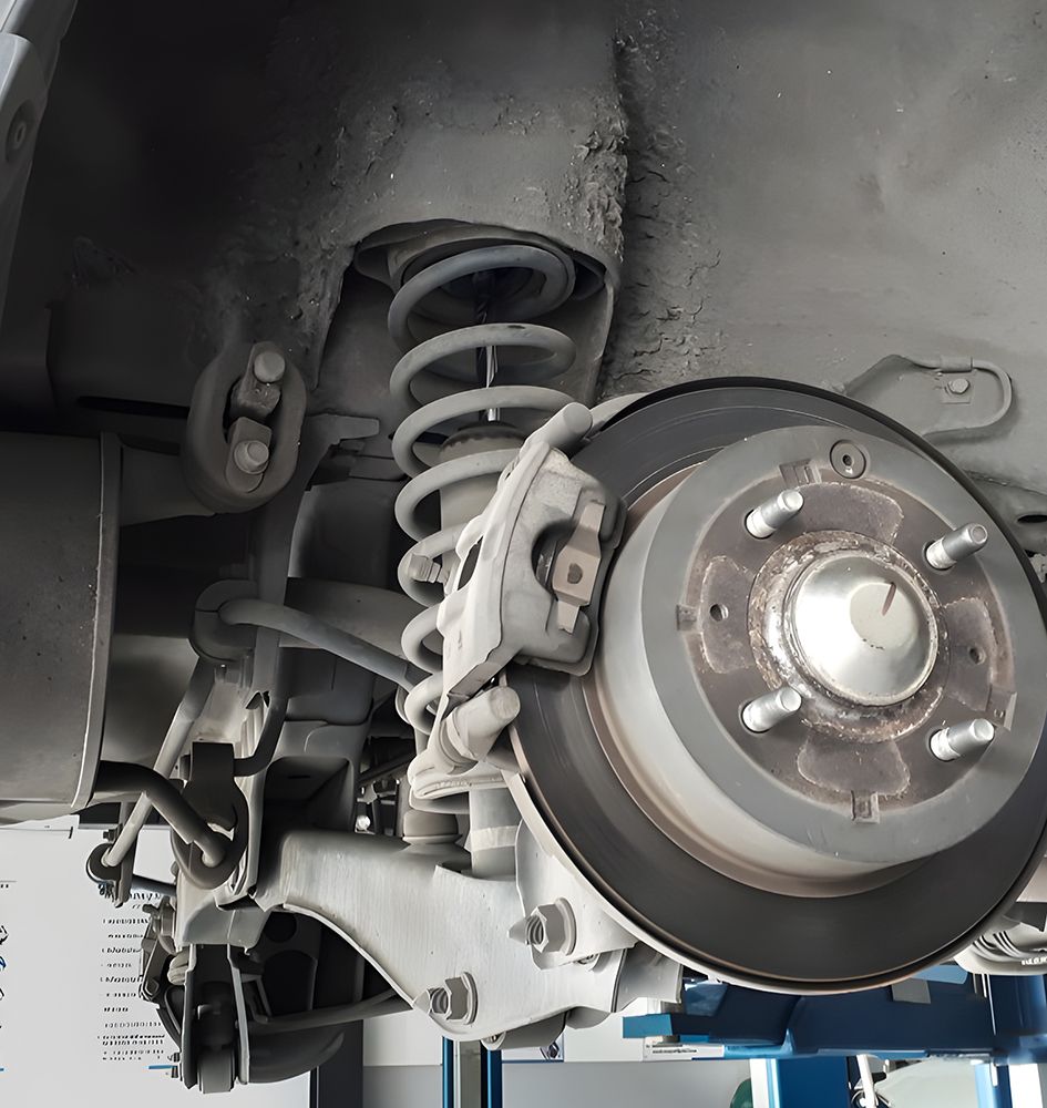 A Close Up of a Car's Suspension and Brake System — Transtate Trailers & 4wd In Belconnen, ACT