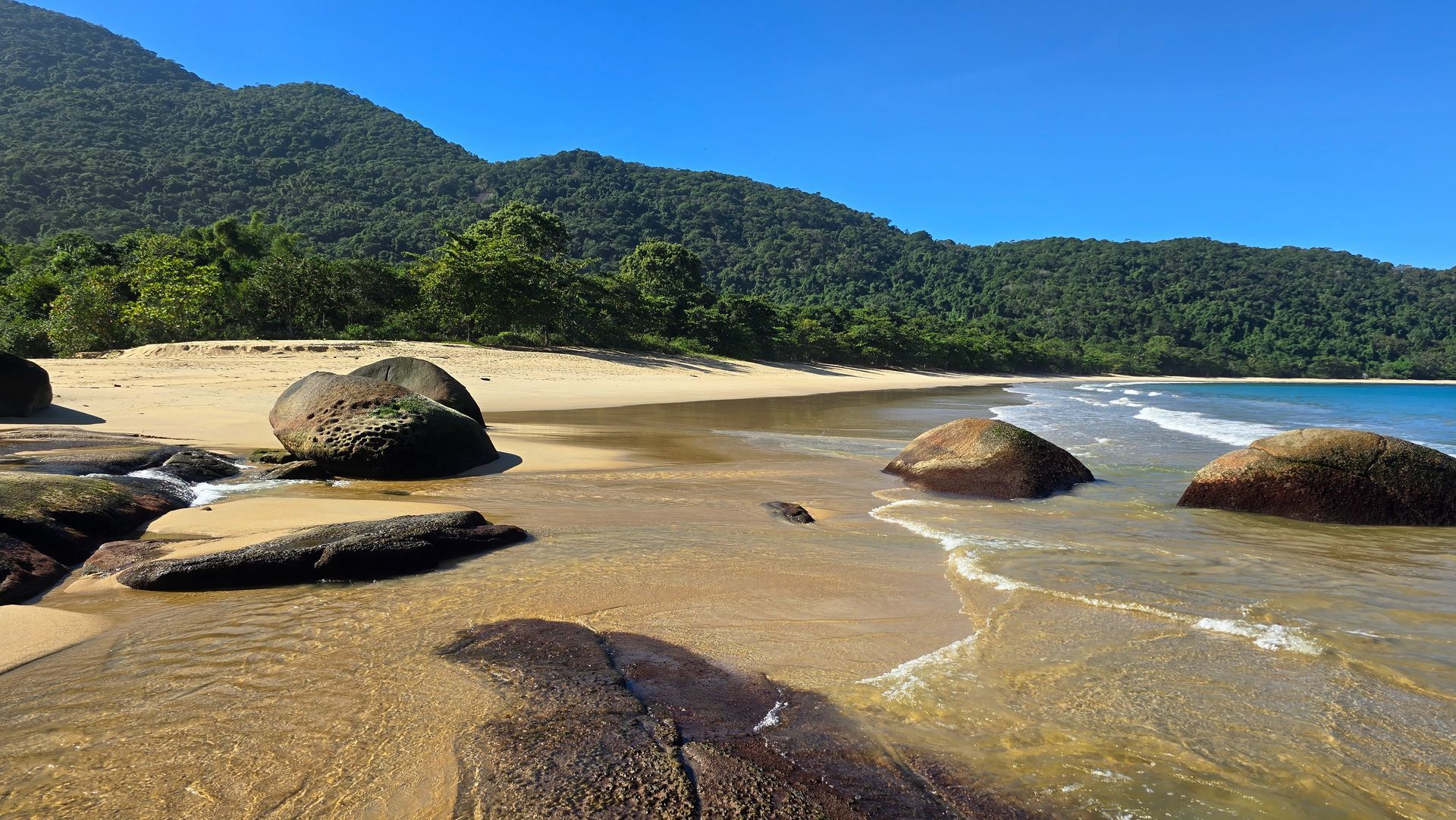 Parnaioca Beach with rocks and calm sea, Ilha Grande