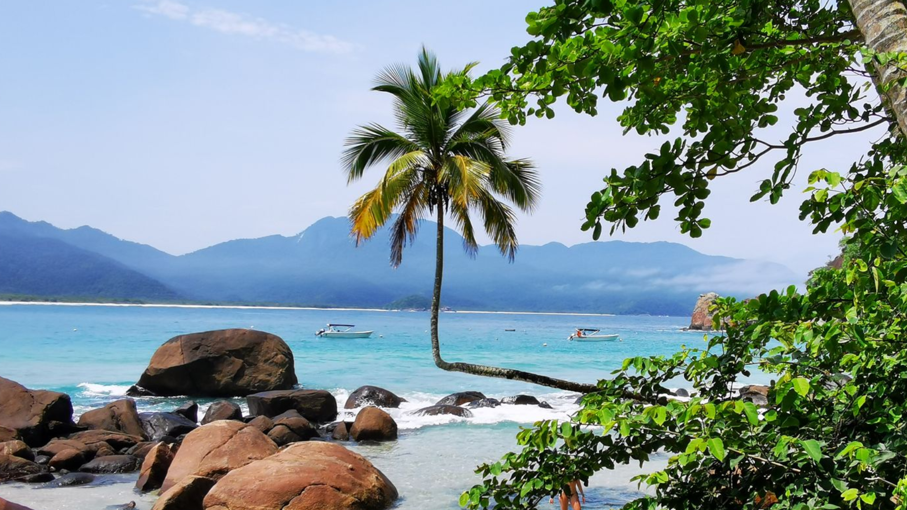 Praia do Aventureiro - Ilha Grande beach in Angra dos Reis, Brazil - clear sea and mountain views