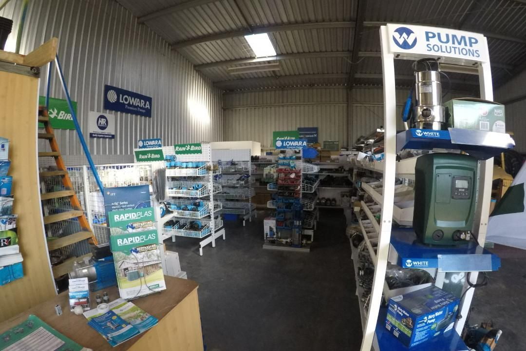 Interior of A Pump Solutions Store with Shelves of Equipment and Signs — Sweeney's Pumps & Irrigation In Medowie, NSW