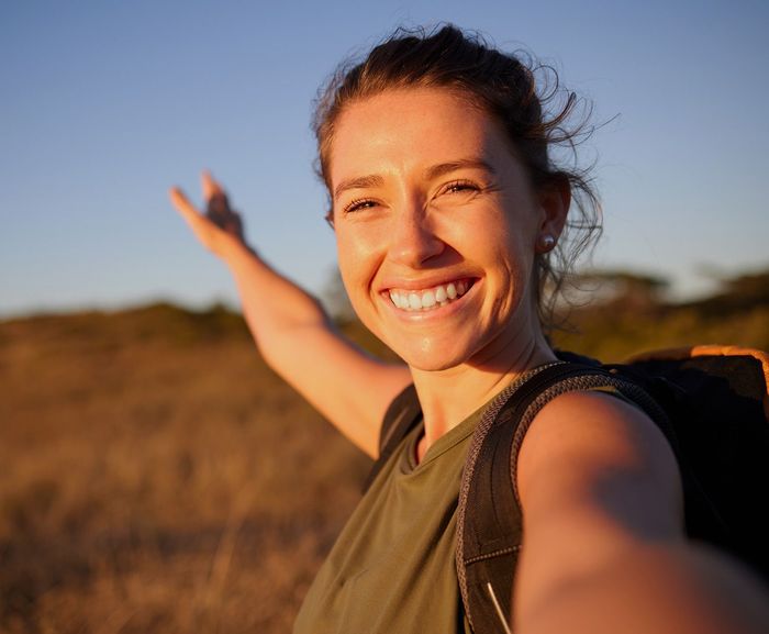 Happy Woman Taking a Selfie Happy Woman Taking a Selfie