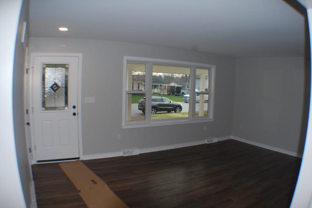 Empty Room With Gray Painted Wall — Manchester, PA — Keystone Restorations & Builders, Inc