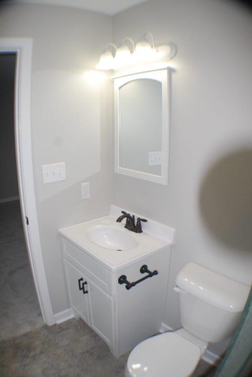 Clean Toilet With Sink & Cabinet — Manchester, PA — Keystone Restorations & Builders, Inc