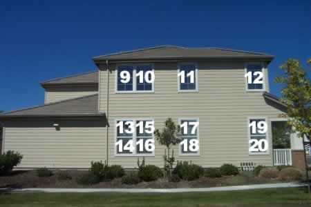 A house with the numbers 9 10 11 12 13 15 17 18 19 20 on the windows