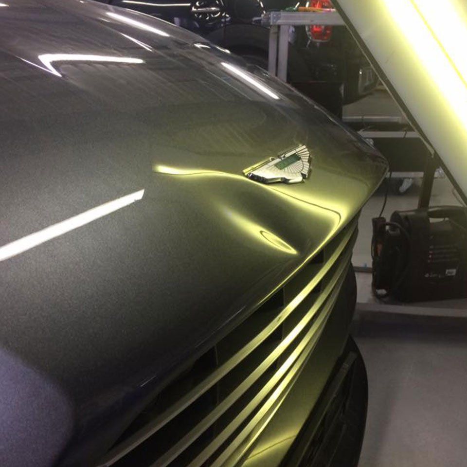 aston hood dent