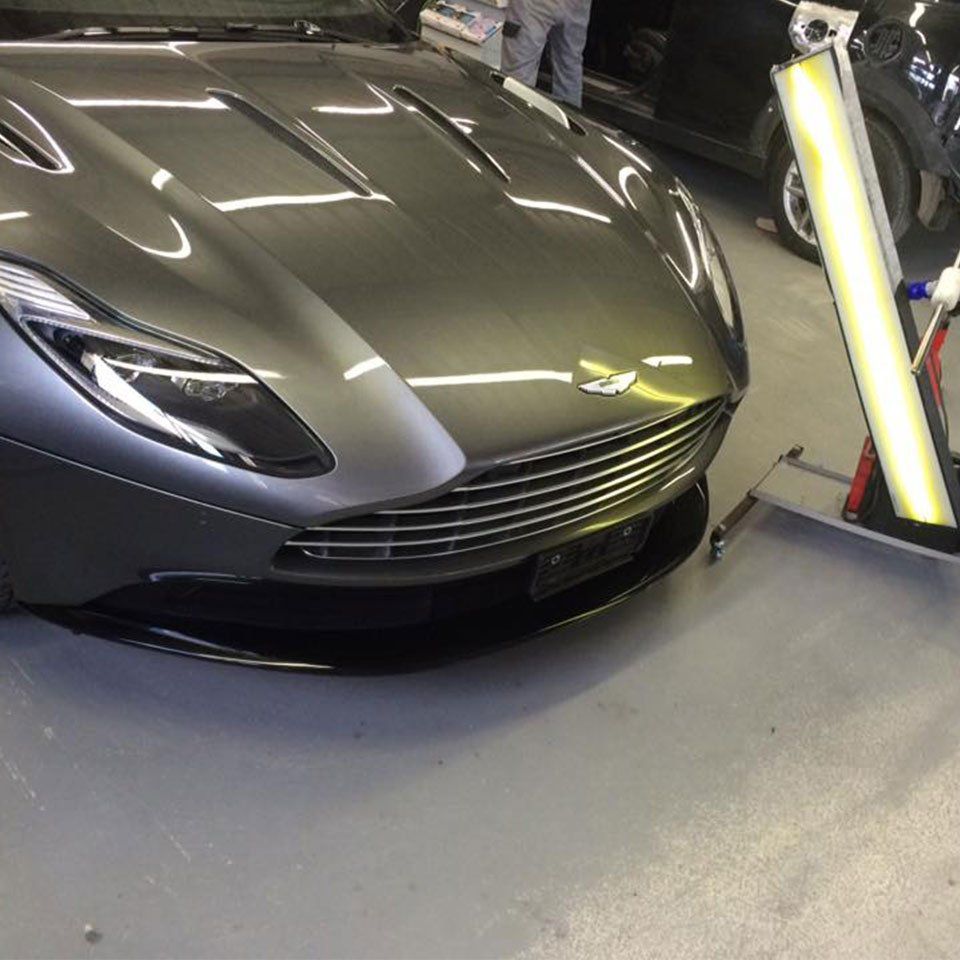 aston hood dent 03