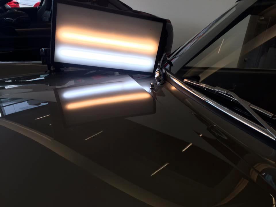 hood dent fix using light