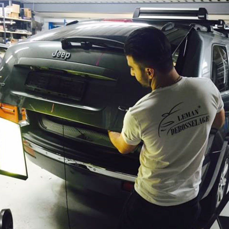 man working on the trunk