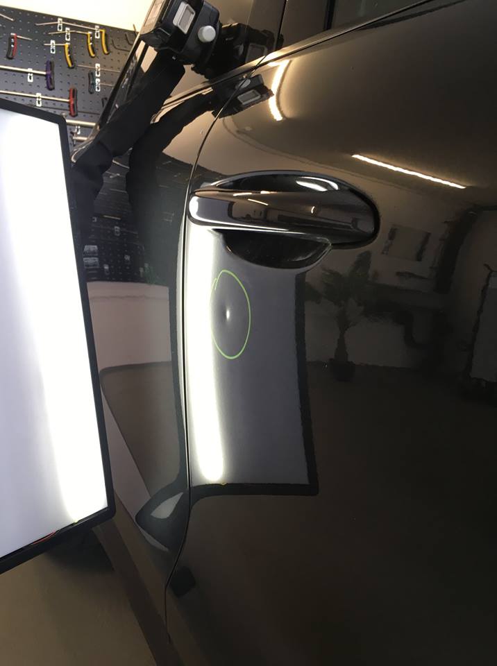 porsche macan door dent