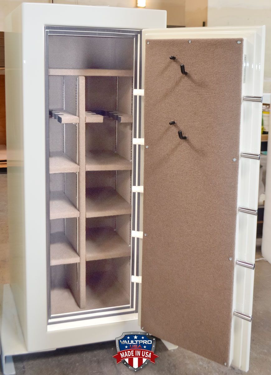 16 Gun safe interior. The model C-625 is fully configurable with both full shelves and long gun racks. Shown with optional two pistol peg door back.