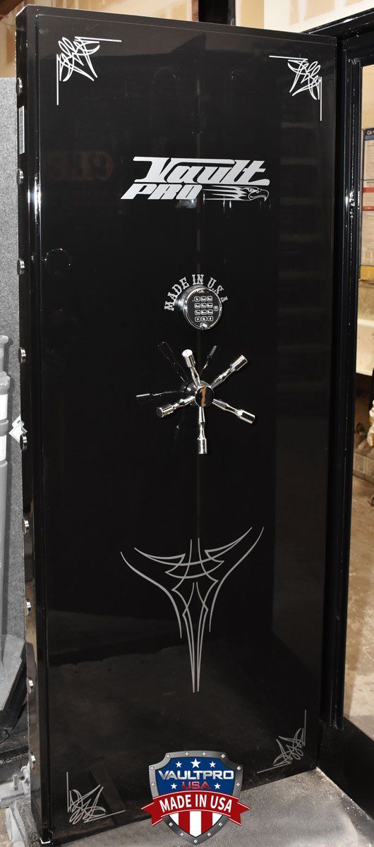 Executive Series vault door in custom gloss black finish. Shown in final inspection area prior to shipping to customer.