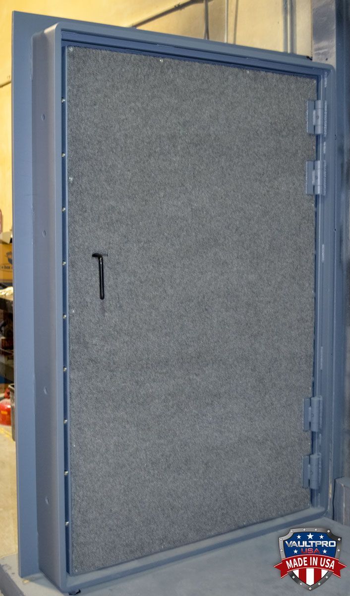 Monster vault door with quadruple hinges, each rated at 2,000 lb. capacity.