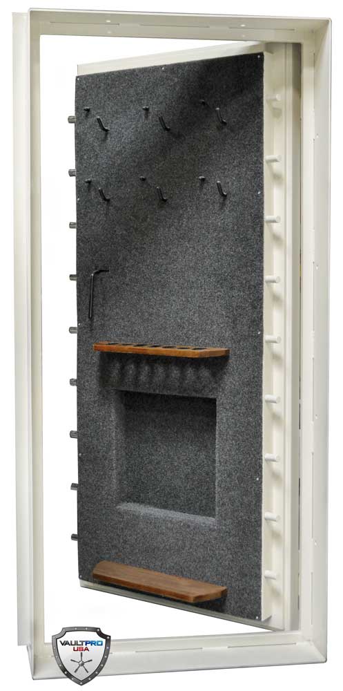 Vault Door with Custom Gun Rack and backing for Rifles with Scopes. Custom Pistol Hangers for Quick Access on upper door.