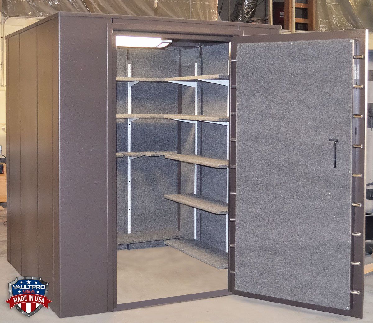 Walk-in Gun Vault with rifle racks and shelves for ammo and accessories,