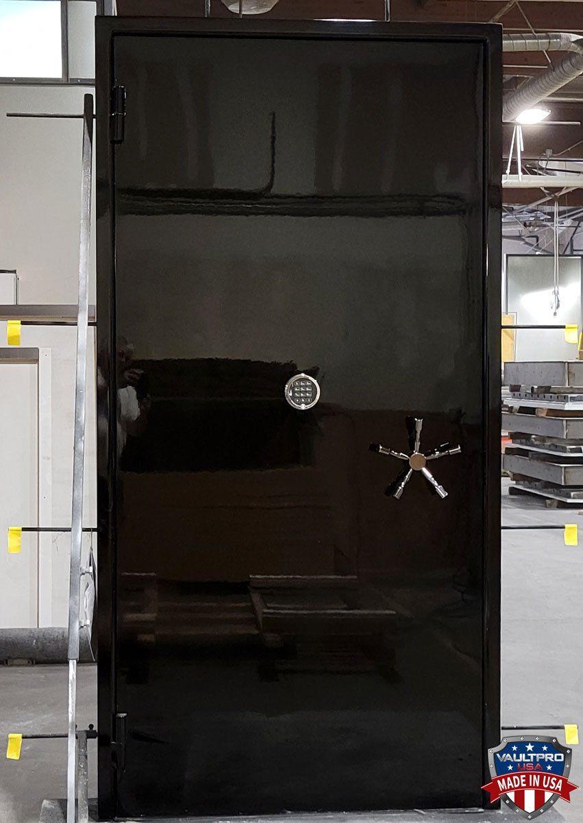 Heavy duty vault door in gloss black finish, with S&G digital audit lock, offset bankers wheel