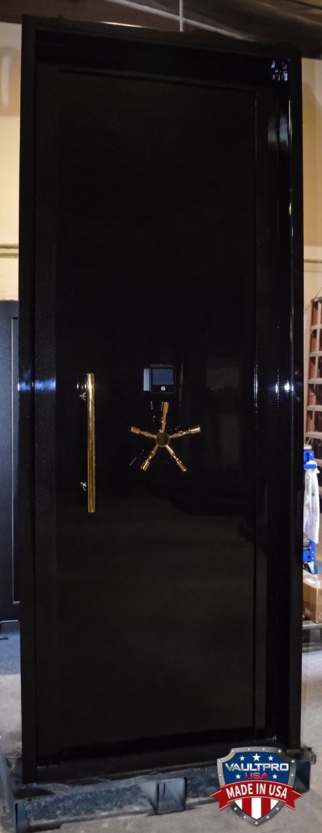 Custom oversize tall vault door with I-Series S&G digital, biometric and Bluetooth enabled lock. Finished in custom gloss black.