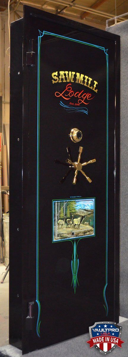 Custom vault door with over the top hand pinstripe and art over a black gloss finish.