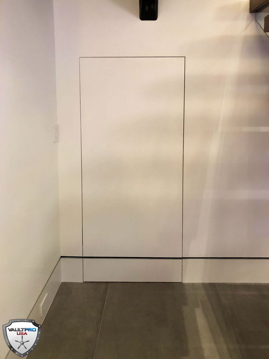 Hidden vault door with outer door closed to conceal vault door from view