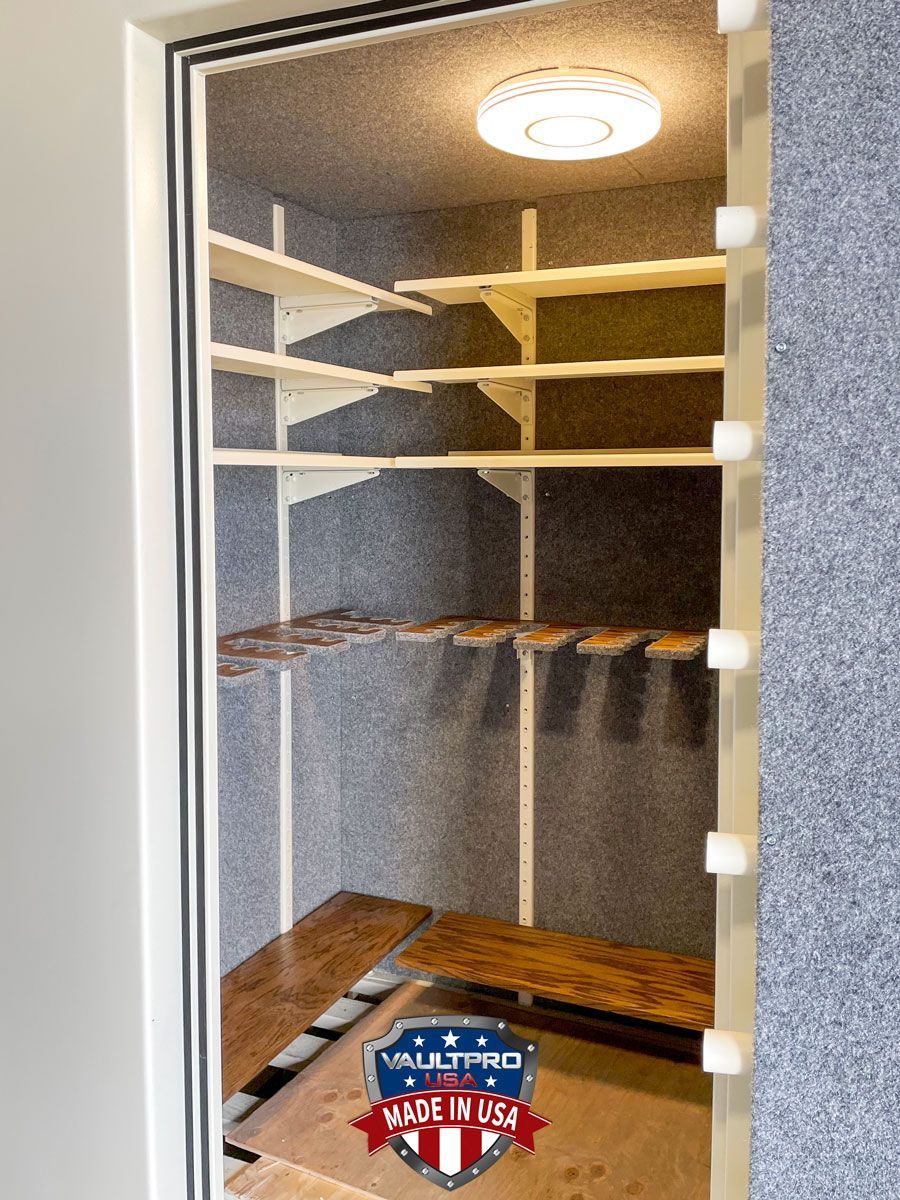 This Defender vault room features custom gun racks and shelves.