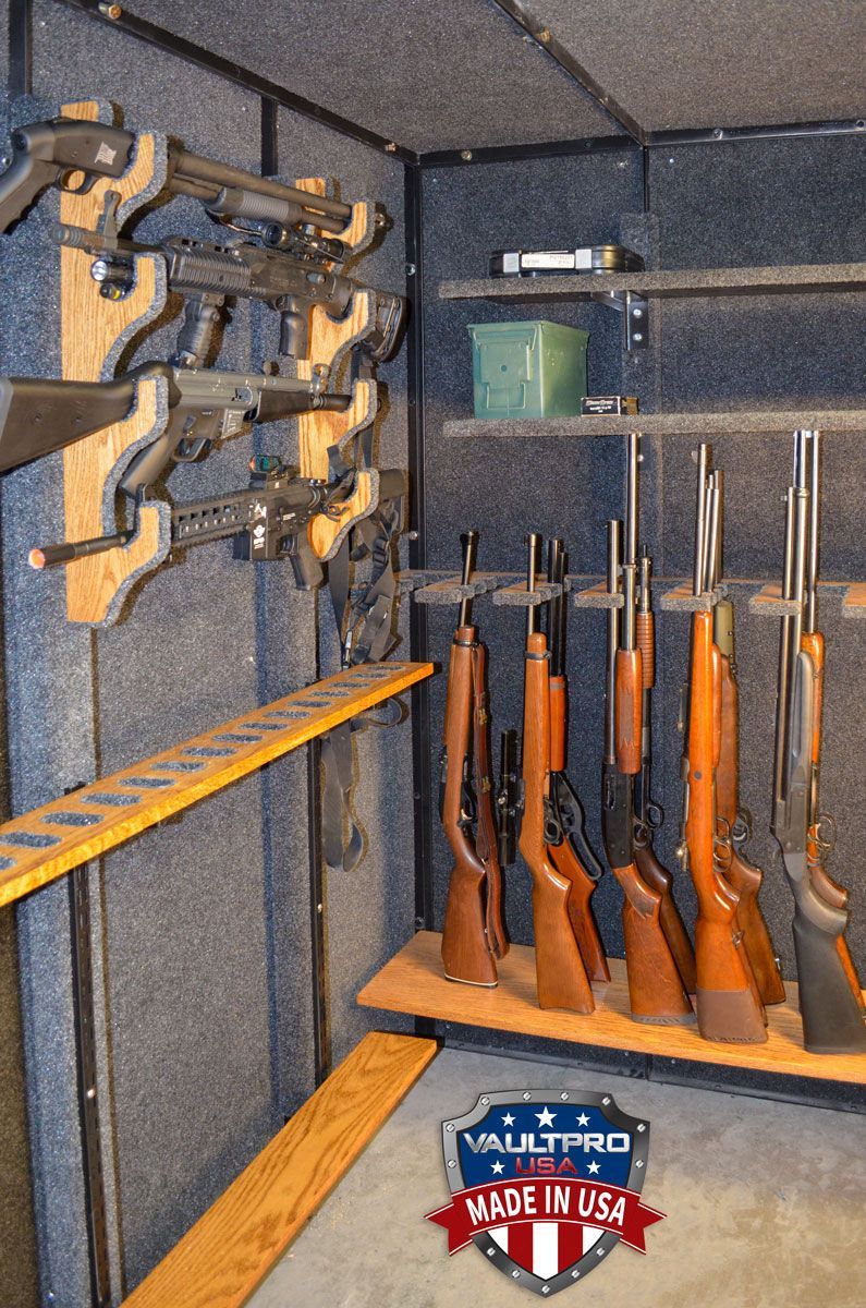Long gun racks horizontal and vertical in vault room.
