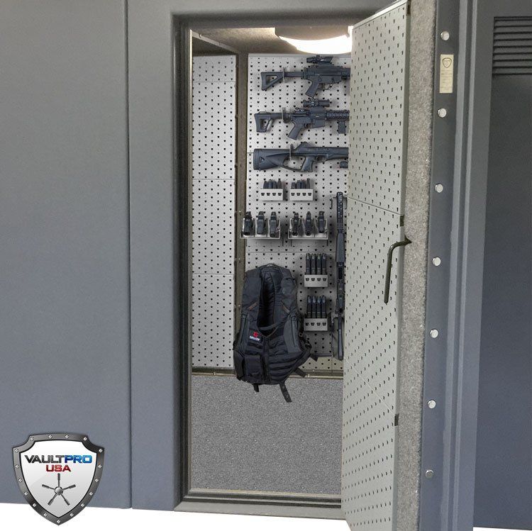 Modular Gun Racks and weapons storage rack mounted on safe door.