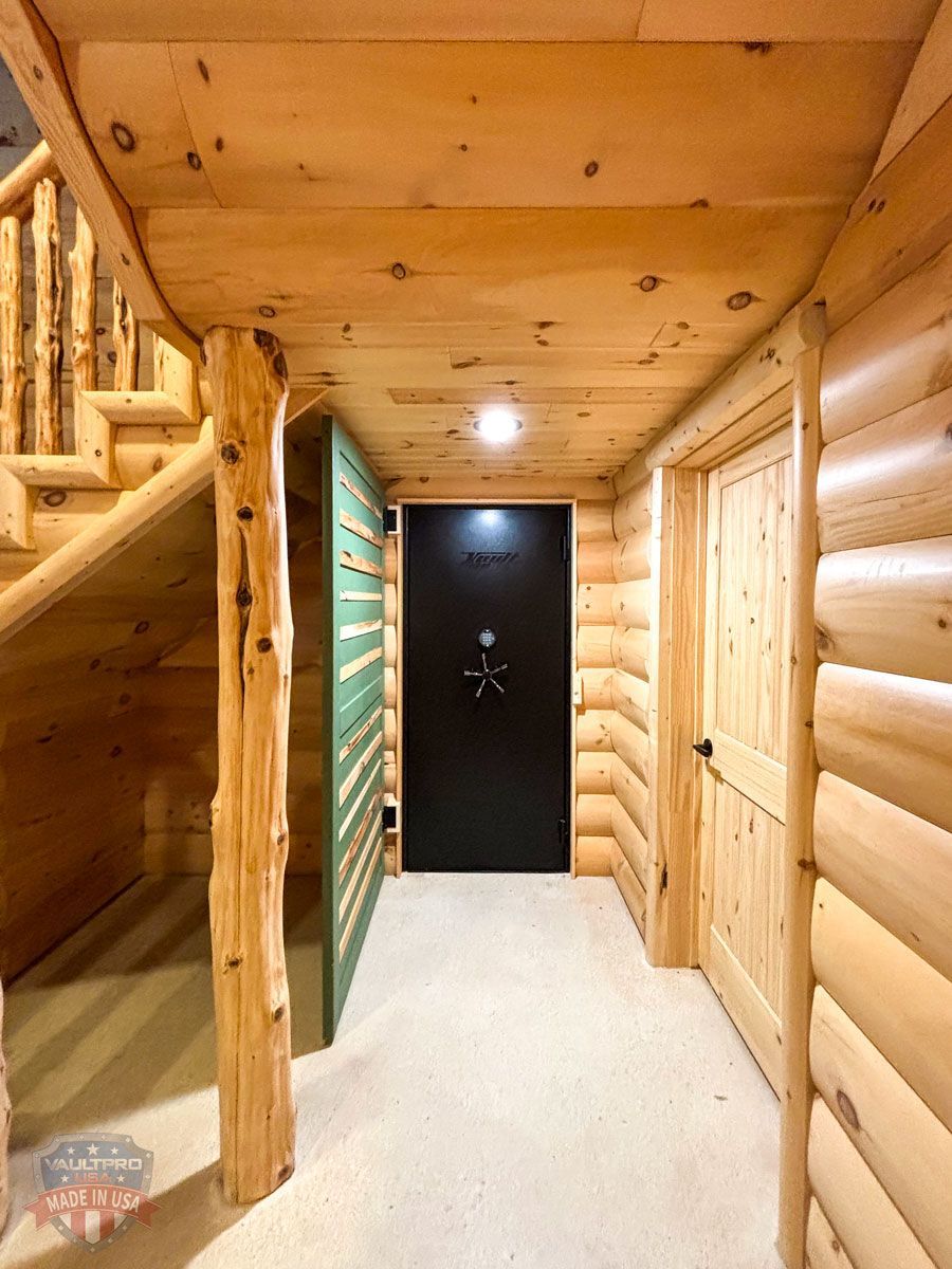 outer door to hidden vault room open showing vault door in closed position