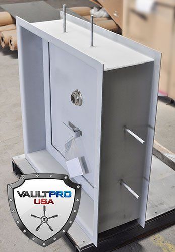 Emergency escape hatch with rebar extensions for pour in place installation.