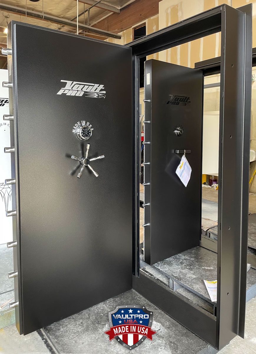 Images of two inswing vault doors. Elite model (foreground), Professional model with optional low profile handle (background). Vault doors made in America by Vault Pro USA.