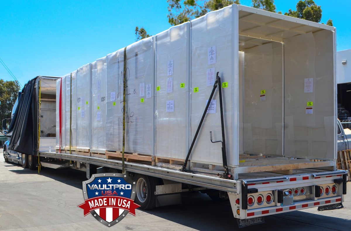 Modular walk in vault sealed and loaded on semi tractor trailer for delivery