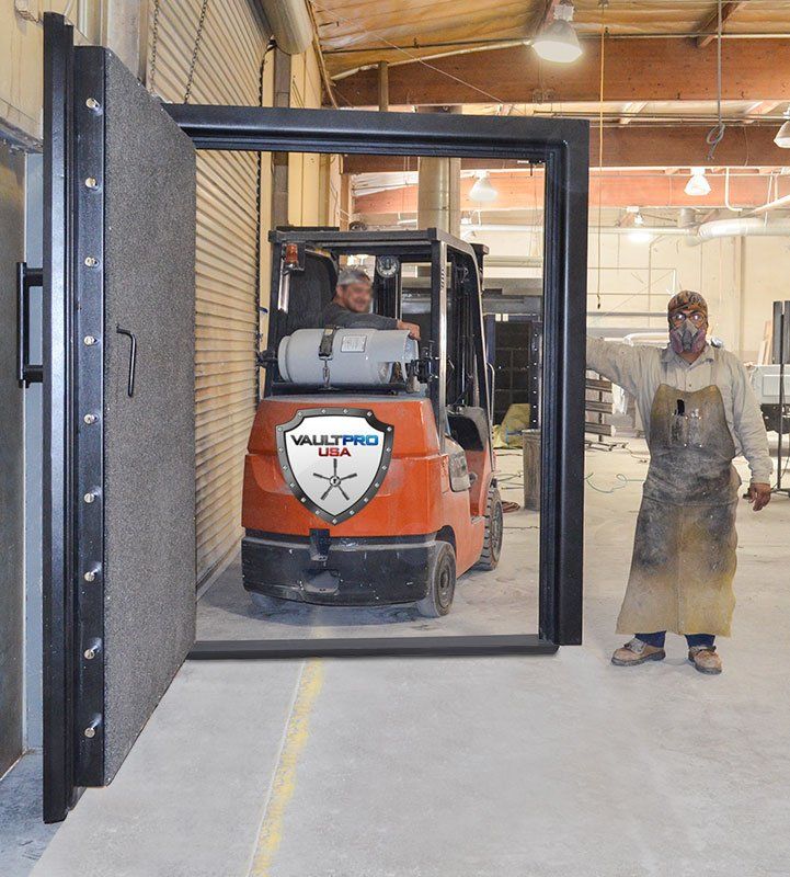 monster vault door with forklift driving through