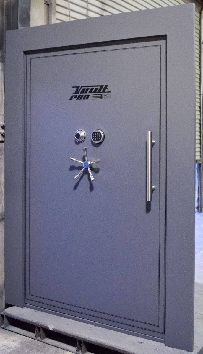 Monster vault door with dual locking system.