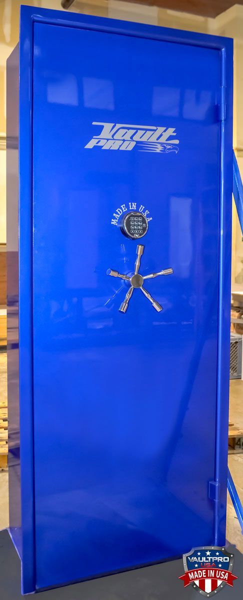 Professional model out swinging vault door in custom Electric Blue gloss finish.